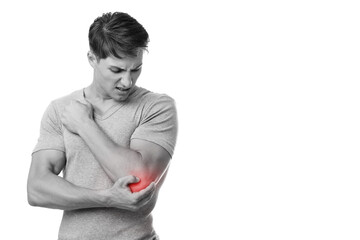 Disappoint young european man suffering from elbow pain, presses hand to sore spot, with red,...
