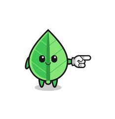 leaf mascot with pointing right gesture