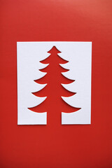 Fototapeta na wymiar Christmas tree paper cutting design papercraft card.