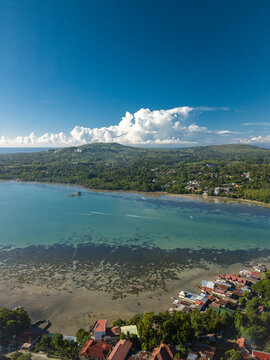 A narrow and shallow body of water separates Panglao Island, and the city of Tagbilaran, Bohol, Philippines.