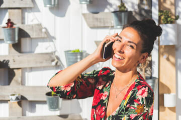 Young woman talking on mobile phone