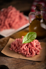 Fresh Minced Meat on vintage wooden background