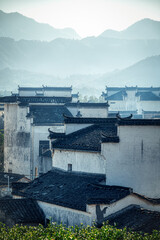 Chinese Hui style buildings in foggy day