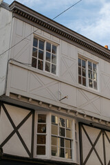 Fototapeta na wymiar Windows of old British townhouse in York England