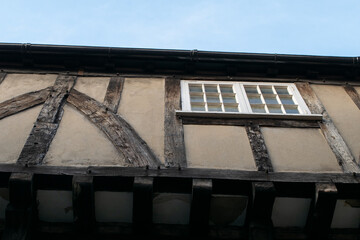 Fototapeta premium Facade of Tudor architecture house and supporting beams in York England