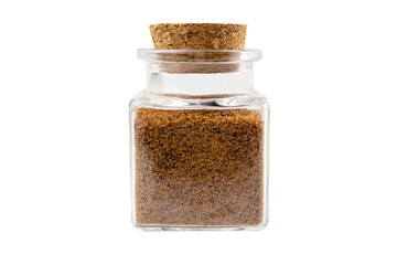 coconut sugar in a glass jar isolated on white background. Spice and food ingredients.