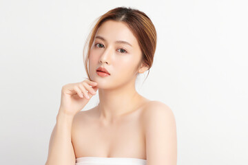 Obraz premium Beautiful young asian woman with clean fresh skin on white background, Face care, Facial treatment, Cosmetology, beauty and spa, Asian women portrait.