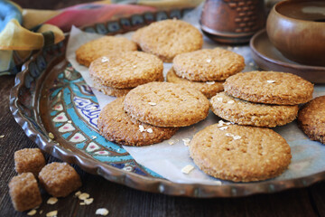 Crispy oatmeal cookies and cup of coffee for coffee break