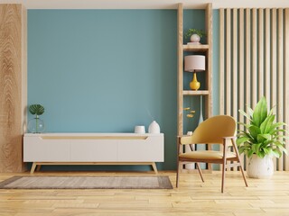 Living room interior with armchair and cabinet for tv on empty blue wall background.