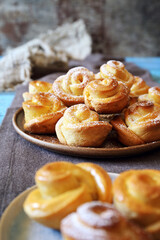 Homemade rose flower buns (biscuit), powdered sugar dressing