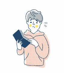 財布の中のお金を見て困っている若い男性