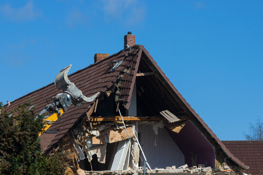 demolition work with crane, demolition building