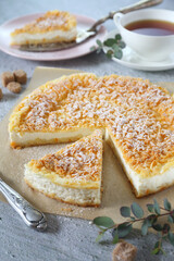 Italian ricotta (cottage cheese) grated tart and cup of tea