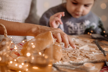 Obraz na płótnie Canvas child baking cookies