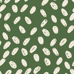 Polka dot beige abstract seamless pattern on green background. Vector design for textile, backgrounds, clothes, wrapping paper, fabric and wallpaper. Fashion illustration seamless pattern.