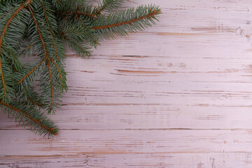 Christmas tree on white wooden background. Copy space.