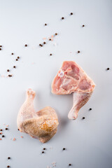 raw turkey thigh on a white background