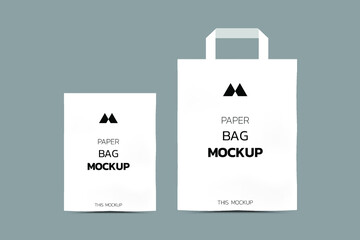 Paper bag mockup, Shopping kraft paper bag with handles isolated on white.