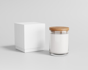 Scented soy candle in glass on the empty background, candel with a box