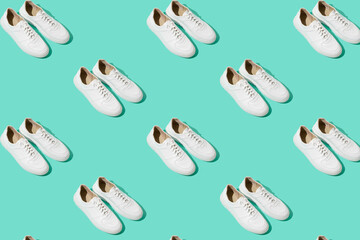 White sneakers pattern on background. The shoes are comfortable and casual. Background for a shoe store.