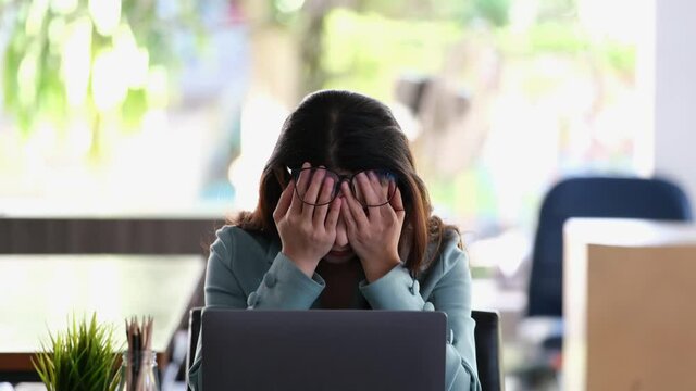 The female company employee expressed fatigue and disappointment at the company's sales that didn't meet the company's goals.