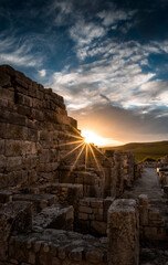 sunset over the ruins
