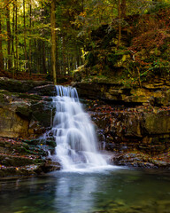 Beautiful waterfall among the canyon in the Carpathian mountains. Manyavsky waterfall.