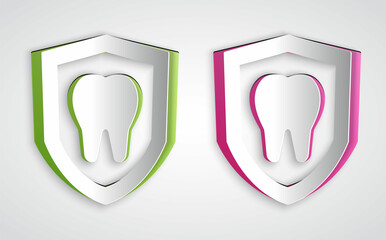 Paper cut Dental protection icon isolated on grey background. Tooth on shield logo. Paper art style. Vector