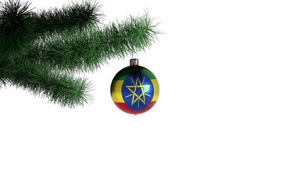 New Year's ball with the flag of Ethiopia on a Christmas tree branch isolated on white background. Christmas and New Year concept.