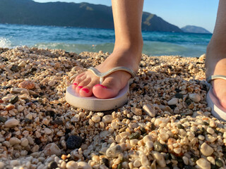 Women's feet with colorful toenails