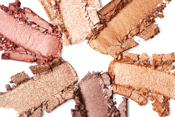 Broken eye shadow isolated on white background