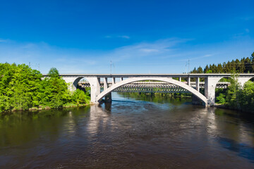 Fototapeta na wymiar Summer aerial view of bridge and Kymijoki river waters in Finland, Kymenlaakso, Kouvola, Koria