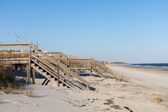 Access Bridges To Litchfield Beach, South Carolina. Housing And Visible People In Far Distance