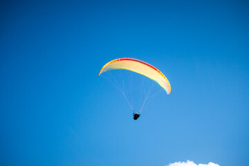 paragliding flight in the mountains. Le Grand-Bornand, France