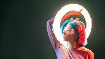 Cyberpunk woman. Synth wave style. Neon light sci-fi. Profile of stylish futuristic model with LED...