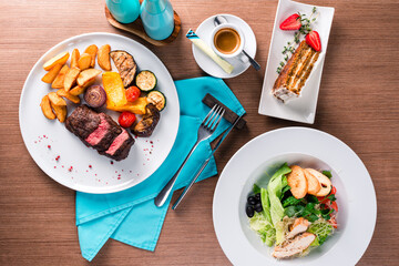 Food. Set of dishes on the table. On a wooden background. Top view. Copy space.