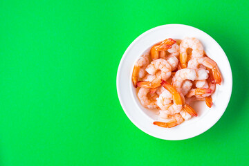shrimps boiled prawns seafood meal snack on the table copy space food background rustic. top view keto or paleo diet pescetarian