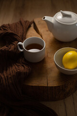 Little cup of hot tea with lemon