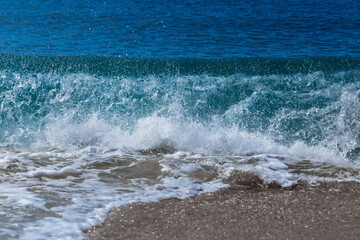 Beautiful ocean waves in summer. Wallpaper style nature background concept.