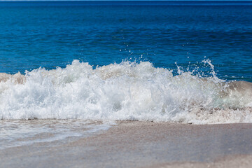 Beautiful ocean waves in summer. Wallpaper style nature background concept.