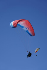 paragliding in the blue sky