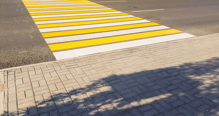 new yellow-white marking of pedestrian crossing, lifestyle, transport concept