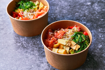  Delicious take away poke bowls on a concrete surface