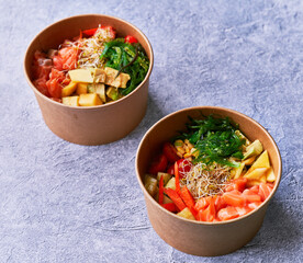  Delicious take away poke bowls on a concrete surface