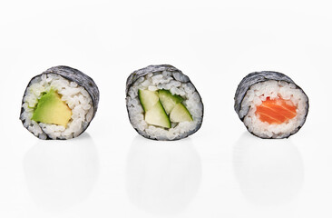  Group of avocado, salmon and cucumber sushi makis isolated on white background