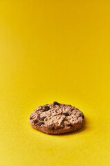  Delicious chocolate cookie on a yellow background