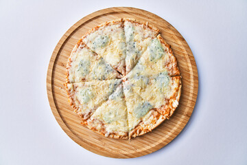 Fototapeta na wymiar Delicious 4 cheeses italian pizza isolated on a white background