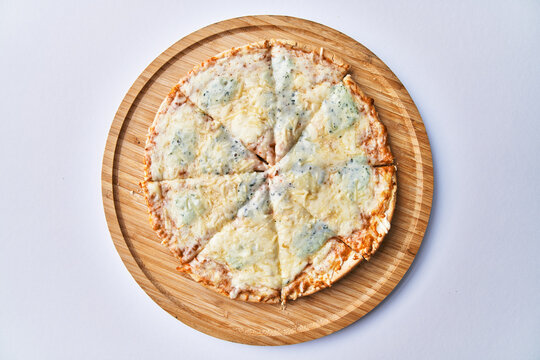  Delicious 4 cheeses italian pizza isolated on a white background