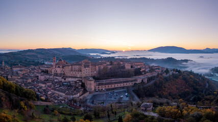 Fototapeta na wymiar Italy november 2021: aerial view of the medieval village of Urbino, a unesco heritage site in the province of Pesaro in the Marche region