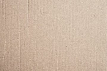 Rustic brown paperboard. Rough cardboard kraft texture